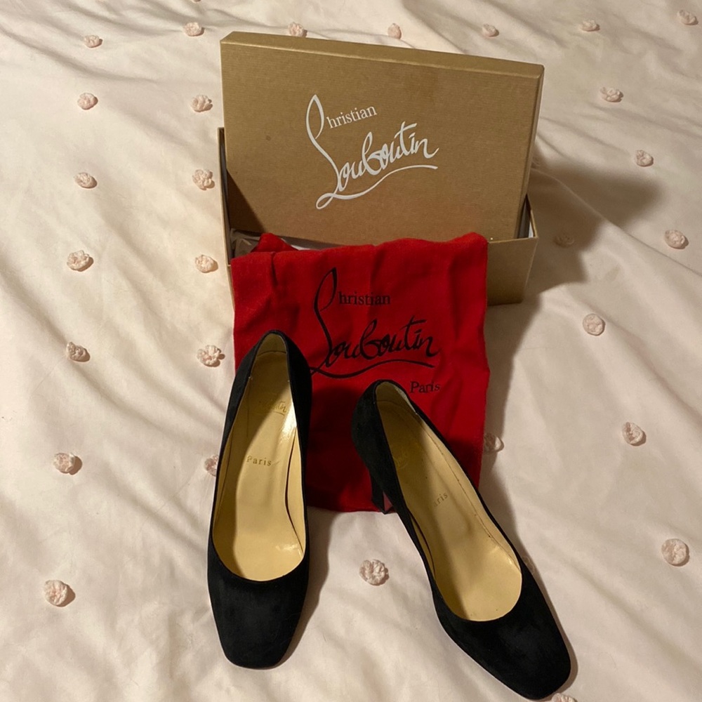 Christian Louboutin black patent leather heels.